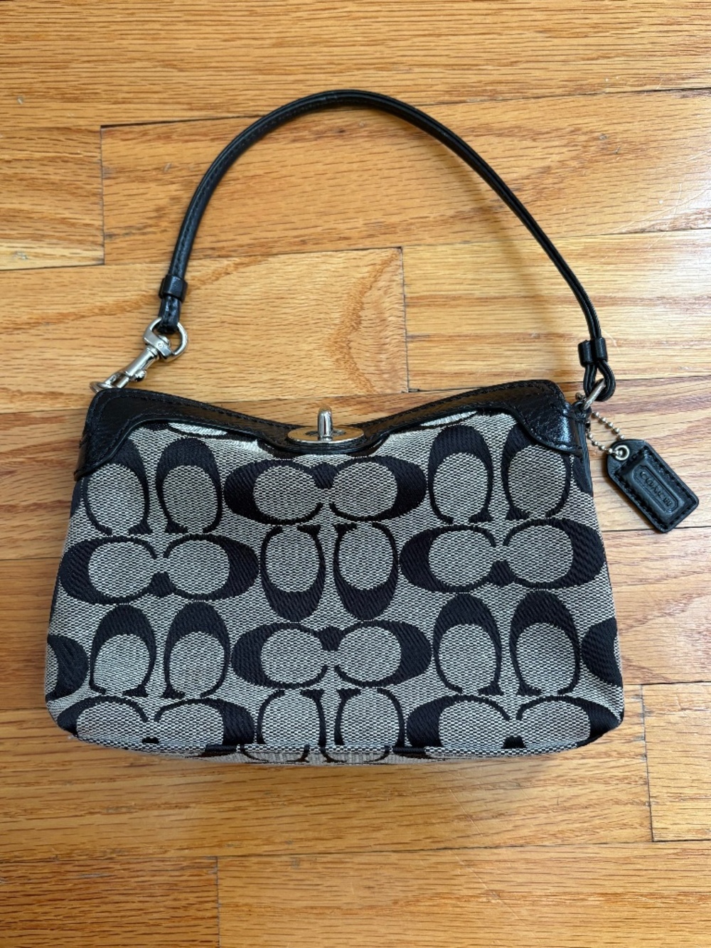 COACH Signature Jacquard Turn Lock Mini bag (wristlet)